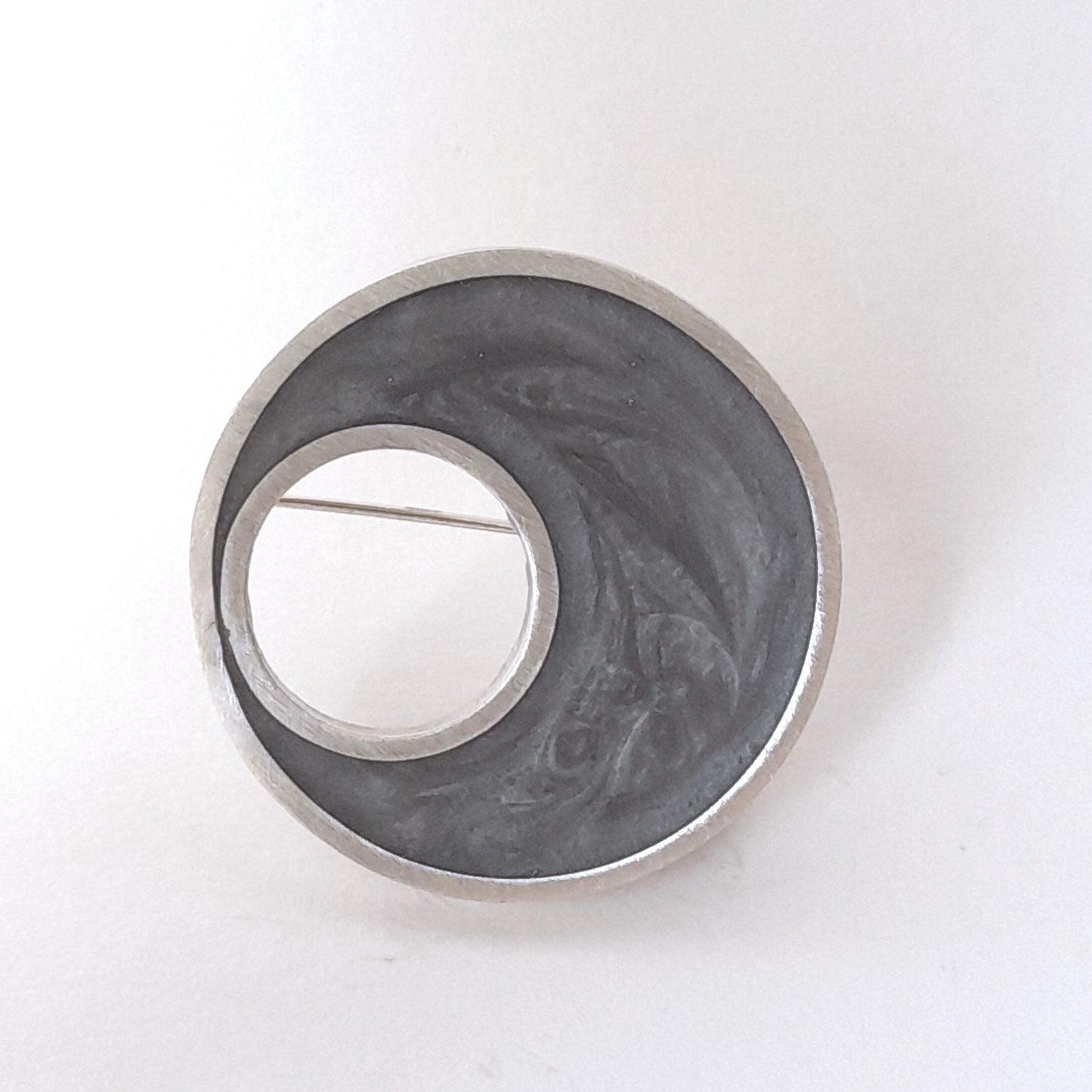 Eclipse brooch