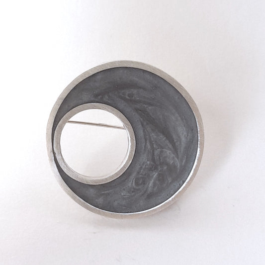 Eclipse brooch
