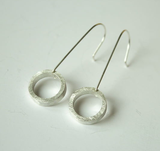 Silver circle drops