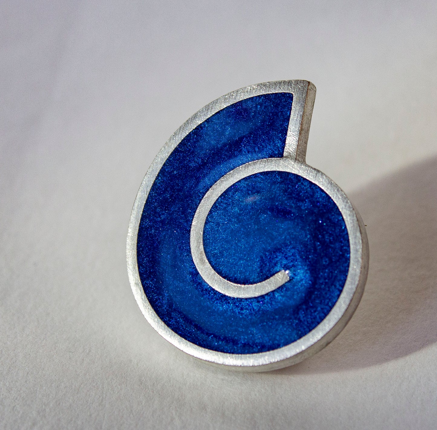 Small spiral brooch